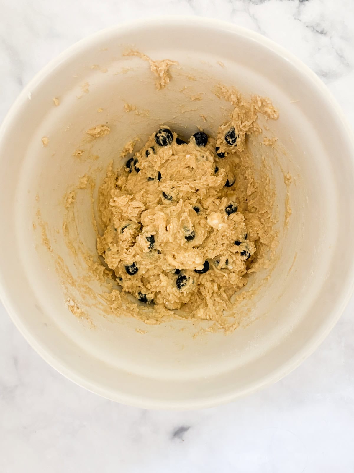 These tender and fluffy gluten free berry buckwheat scones are made with buckwheat and almond flours, yogurt, and fresh or frozen berries. Forming the dough for buckwheat scones.