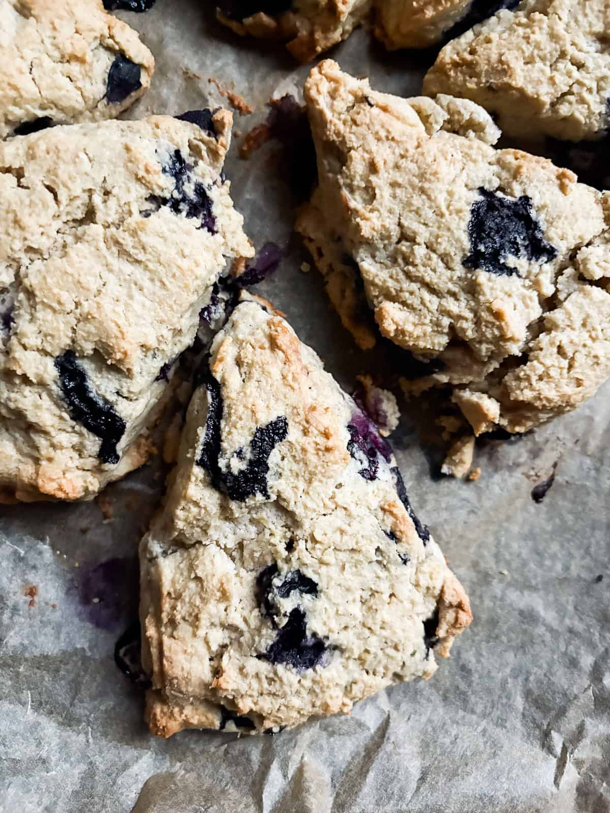 These tender and fluffy gluten free berry buckwheat scones are made with buckwheat and almond flours, yogurt, and fresh or frozen berries. Baked berry buckwheat scones.