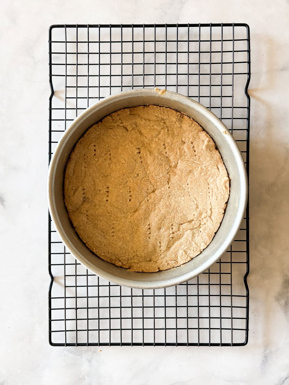 Melt-in-your-mouth gluten free lavender shortbread cookies are made with plenty of butter and infused with a bit of fresh or dried lavender. Gluten free lavender shortbread cookies cool in the pan.