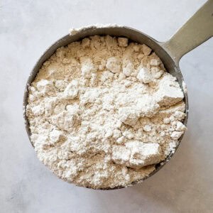 Homemade gluten free cake flour in a measuring cup;