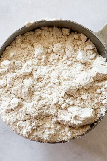 Homemade gluten free cake flour in a measuring cup;