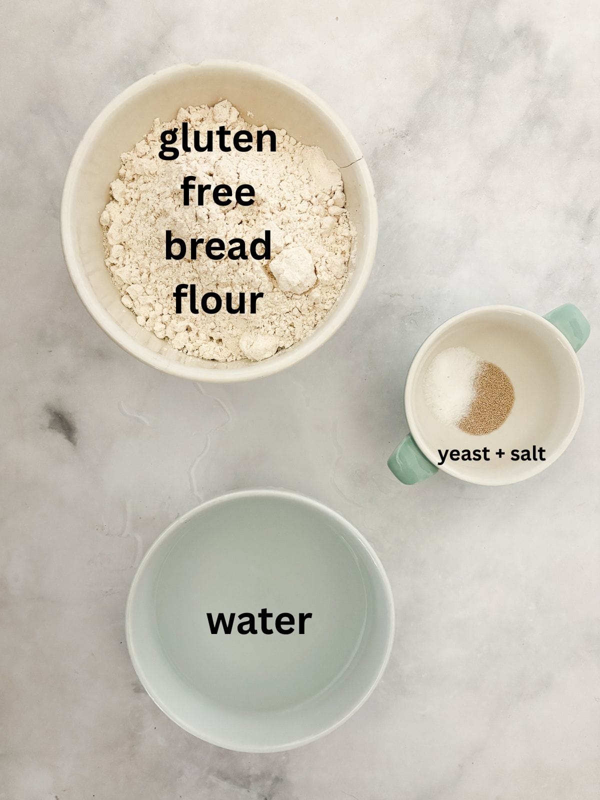 A crusty gluten-free no-knead bread recipe made with 4 simple ingredients. It bakes up perfectly every time and rivals any wheat-based bread! Ingredients for gluten-free no knead bread are text-labeled.