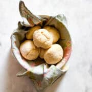 A napkin-lined bowl of soda biscuits.