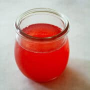 A jar of rhubarb simple syrup.