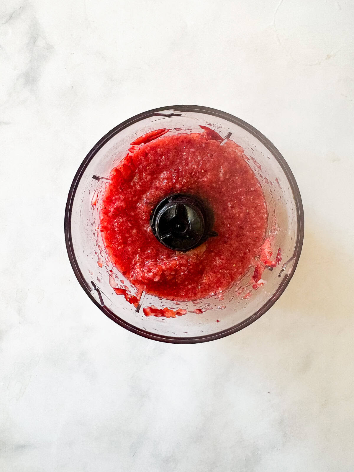 This beautiful strawberry cocktail can be made with or without gin, and is packed with fresh strawberries and mint! Strawberry puree in a food processor.