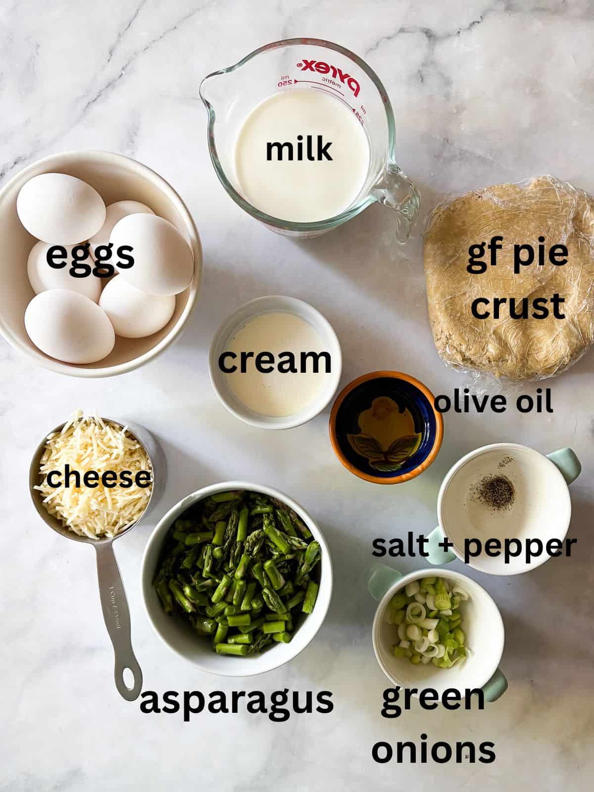 This gluten free asparagus quiche is packed with springy asparagus and salty parmesan cheese to make a wonderful brunch or dinner dish! Ingredients for gluten free asparagus quiche are text-labeled.