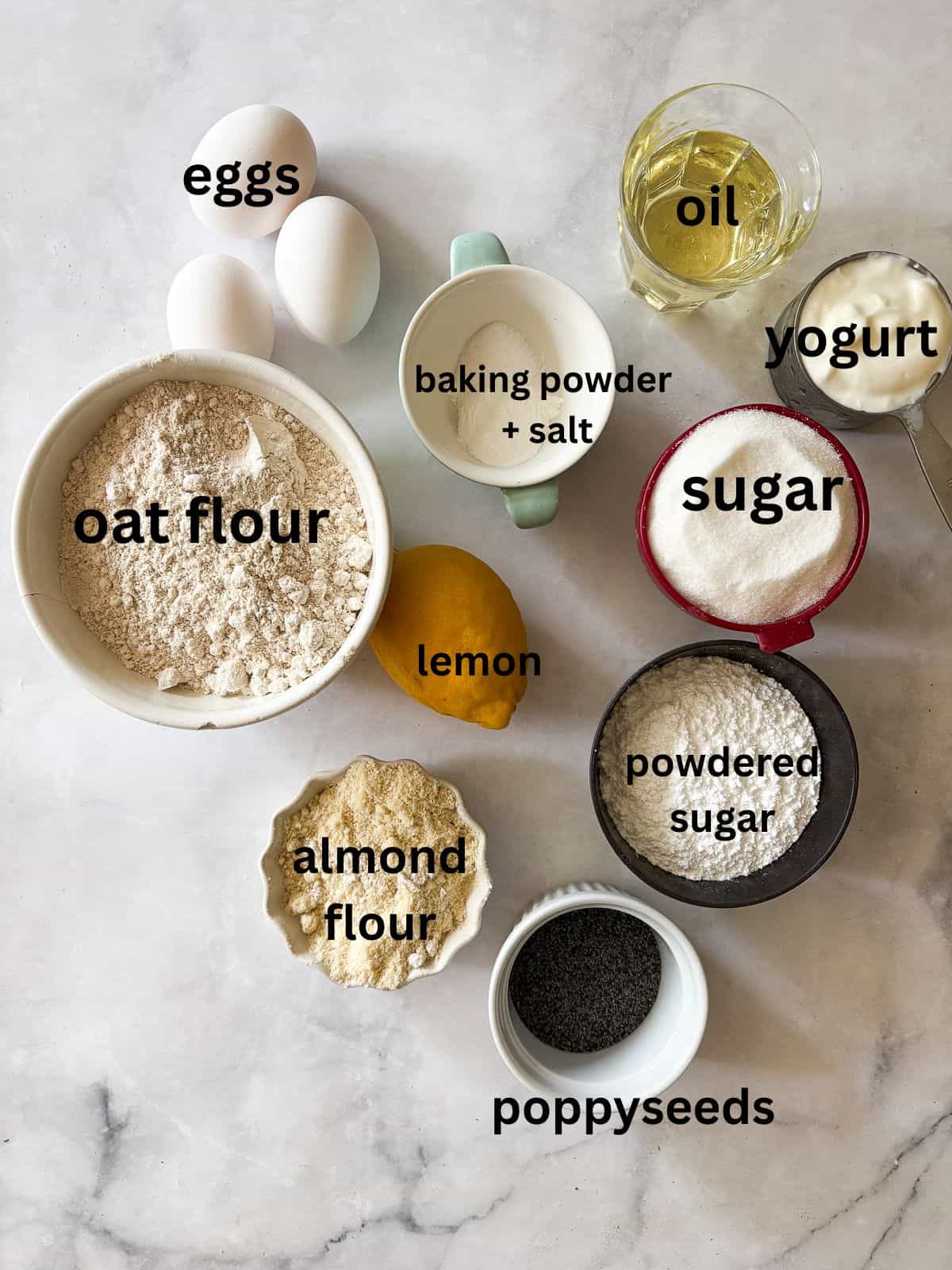 A tender, gorgeously sliceable gluten free lemon poppyseed bread topped with a bright, thick lemon glaze for maximum flavor. Ingredients for gluten free lemon poppyseed bread are text-labeled.