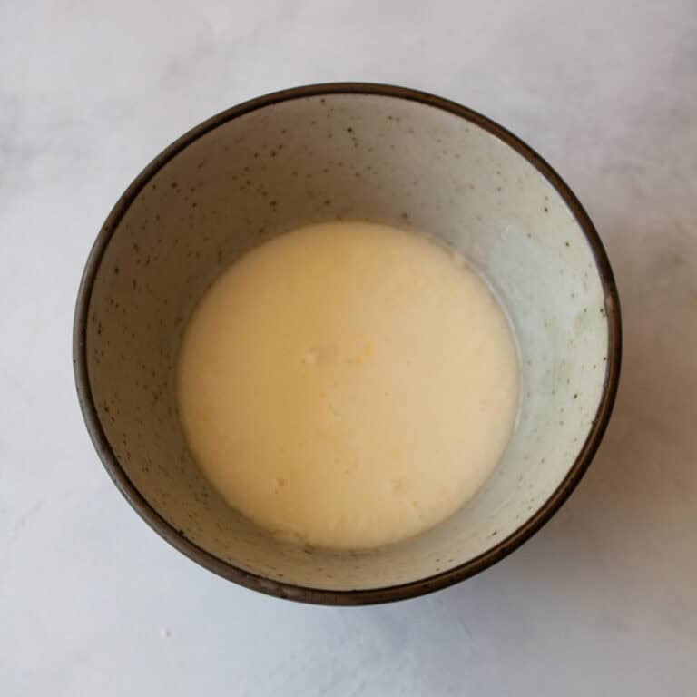 Orange glaze in a bowl.