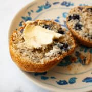 Butter on a whole wheat blueberry muffin.