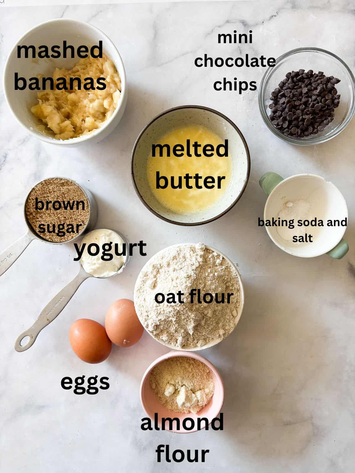 This banana snack cake is fluffy, moist, and balanced by warming spices. Naturally gluten-free, or make it with whole wheat flour. Ingredients for banana snack care are text-labeled.