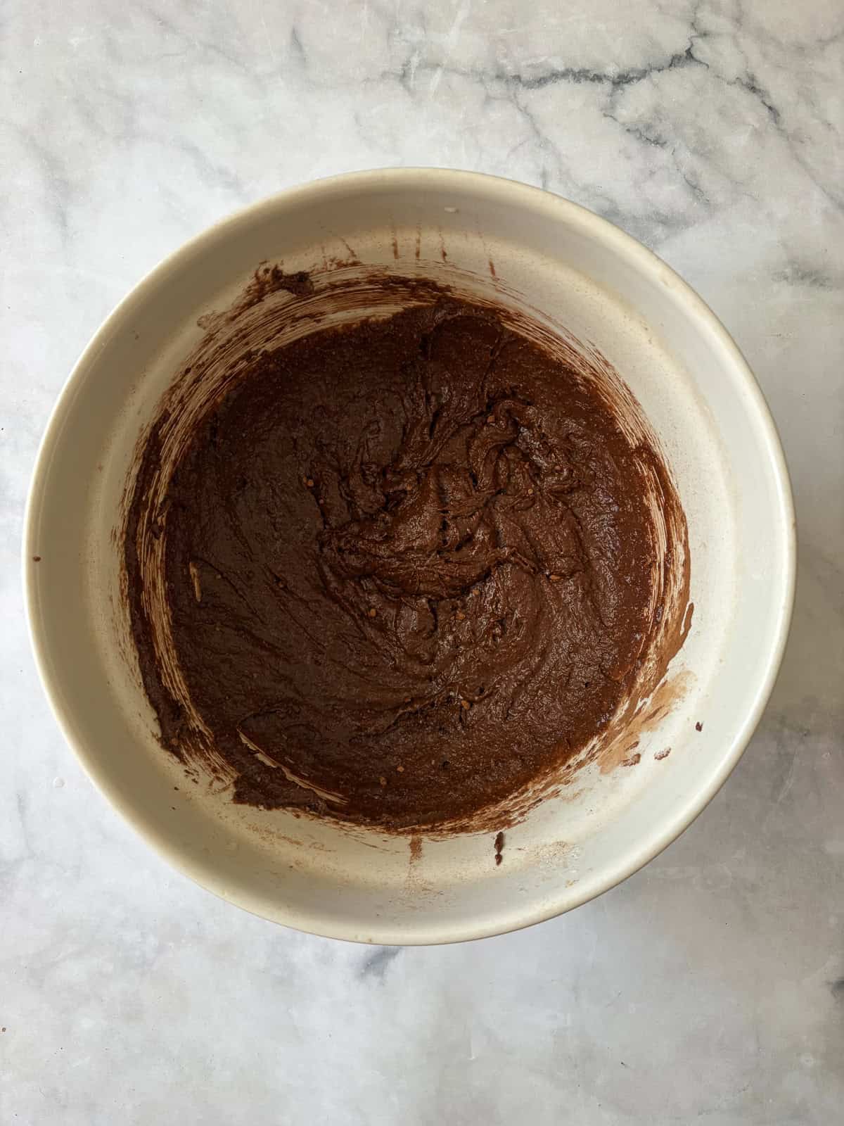 Deeply rich and chocolatey almond flour brownies are both grain-free and gluten-free. So much better than a boxed mix! The remaining ingredients are added to the bowl.