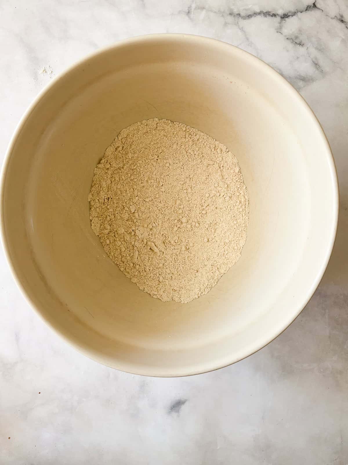 A tender and flaky gluten-free pastry wraps around sweet-tart slices of rhubarb in this rustic gluten free rhubarb galette. Flour mixed with sugar and salt for gluten free galette dough.