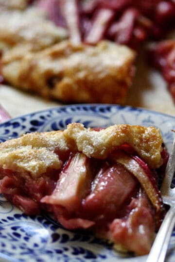 A slice of rhubarb galette on a plate.