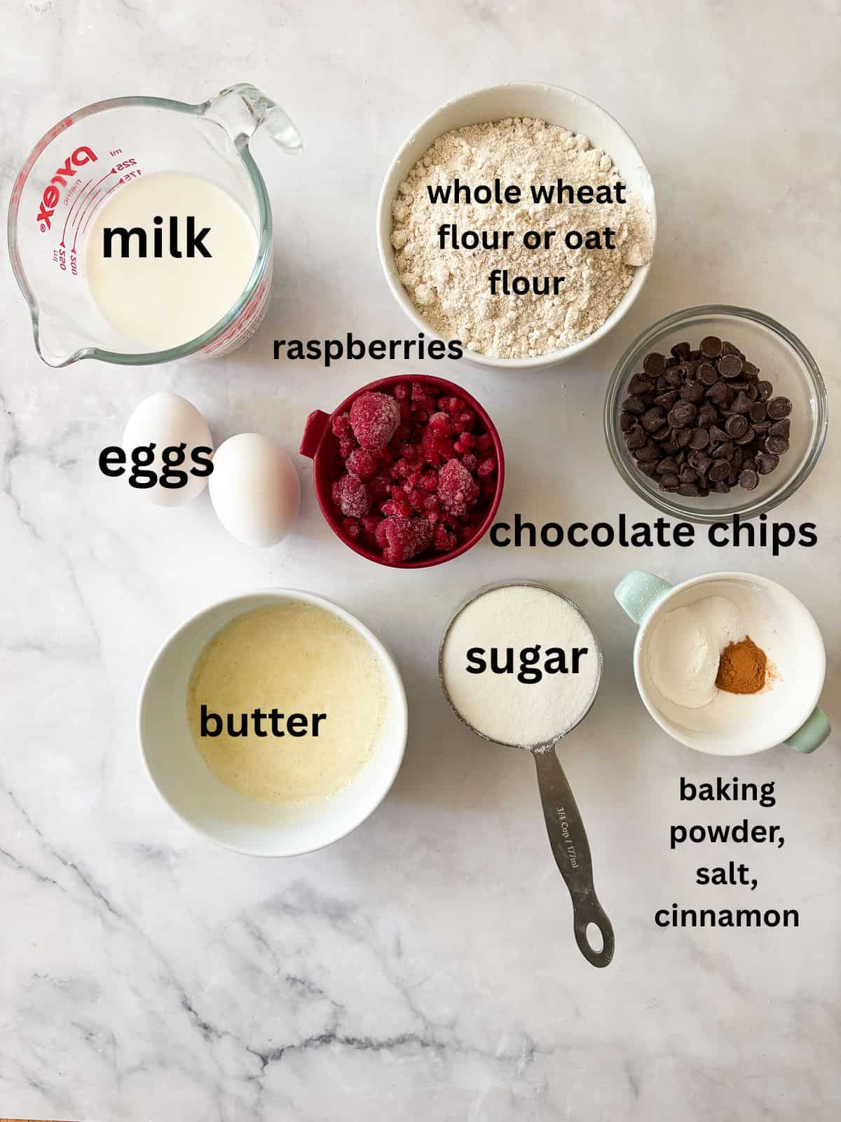 Soft and tender chocolate chip raspberry muffins are made with whole grain flour (easily gluten-free), fruit, and semisweet chocolate!