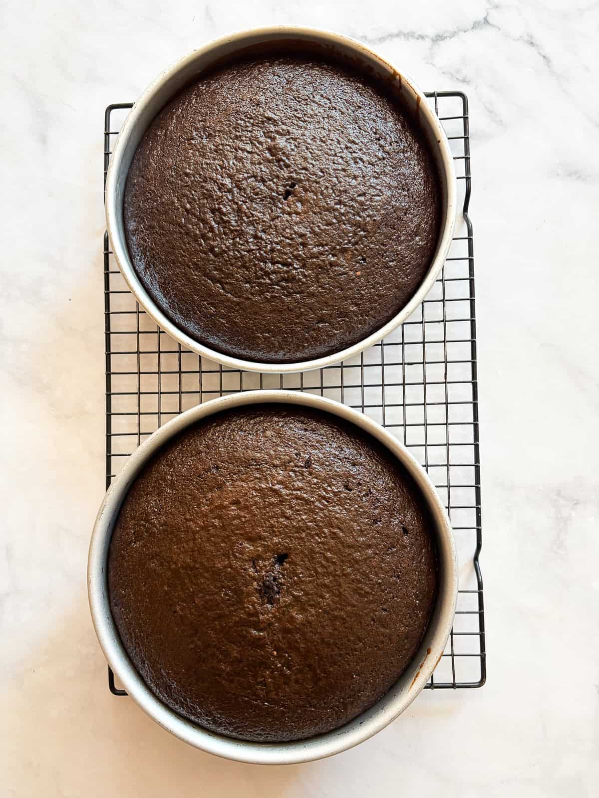 This tender, naturally higher-protein chocolate cake delivers 8 grams of protein per slice from whole foods ingredients. NO protein powder! Two rounds of protein chocolate cake cool.