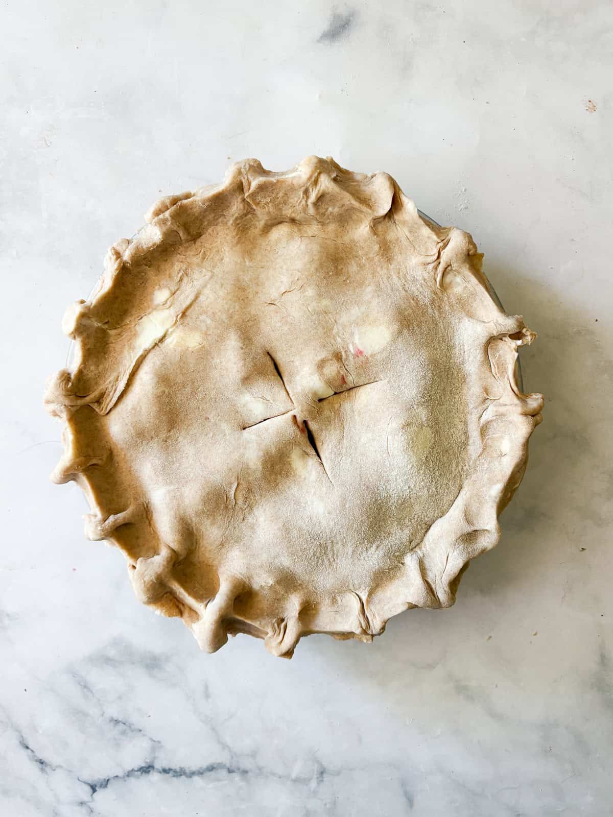 A classic method is used to make this blueberry blackberry pie, which features fresh summer berries folded into a tender crust. A blueberry blackberry pie before being baked.