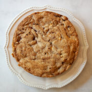 A blackberry apple cake on a plate.