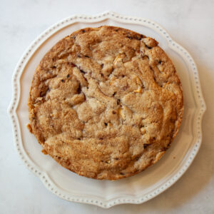 A blackberry apple cake on a plate.