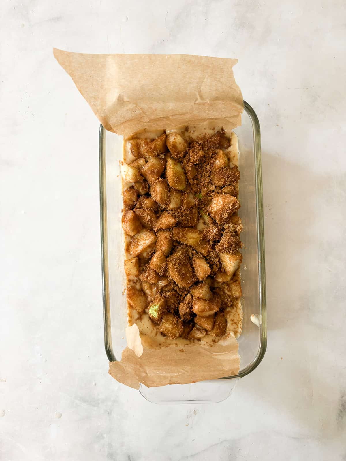 This one-bowl pear bread is a lovely sweet nibble, with a cozy mix of cinnamon and brown sugar-laced chopped pears in a whole grain loaf. Pears are layered onto batter for pear bread.