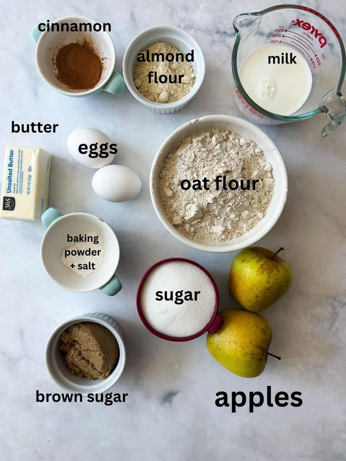 This gluten free apple bread is soft, buttery, and generously layered with fresh apples, cinnamon, and brown sugar. A one-bowl recipe! Ingredients for gluten free apple bread are text-labeled.