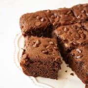 A side view of a slice of almond flour chocolate cake.