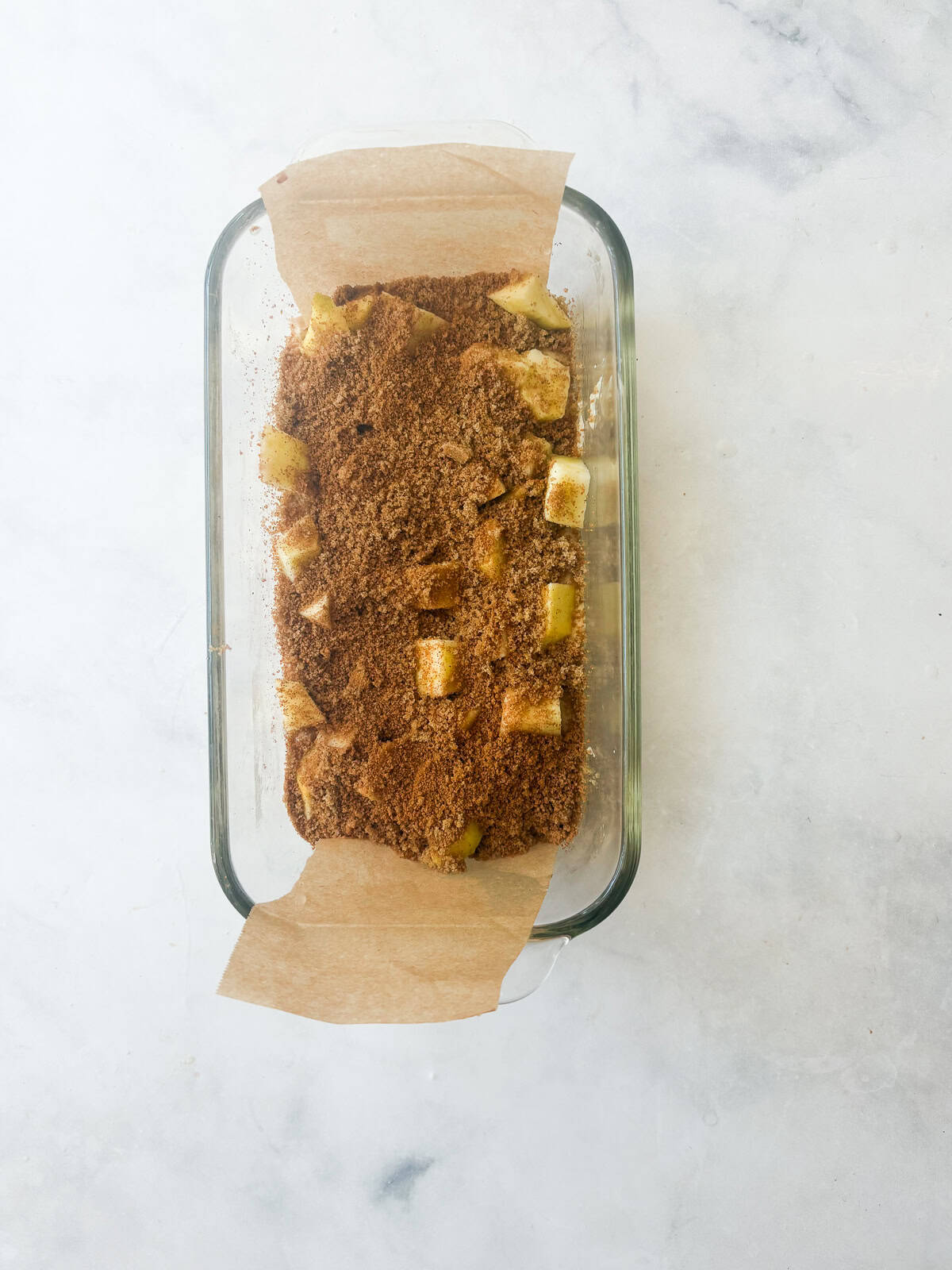 This gluten free apple bread is soft, buttery, and generously layered with fresh apples, cinnamon, and brown sugar. A one-bowl recipe! Brown sugar, cinnamon, and apples are added to gluten free apple bread batter.