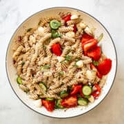 A big bowl of gluten free pasta salad.