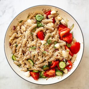 A big bowl of gluten free pasta salad.