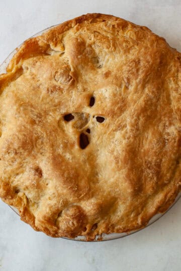 A baked Gravenstein apple pie.