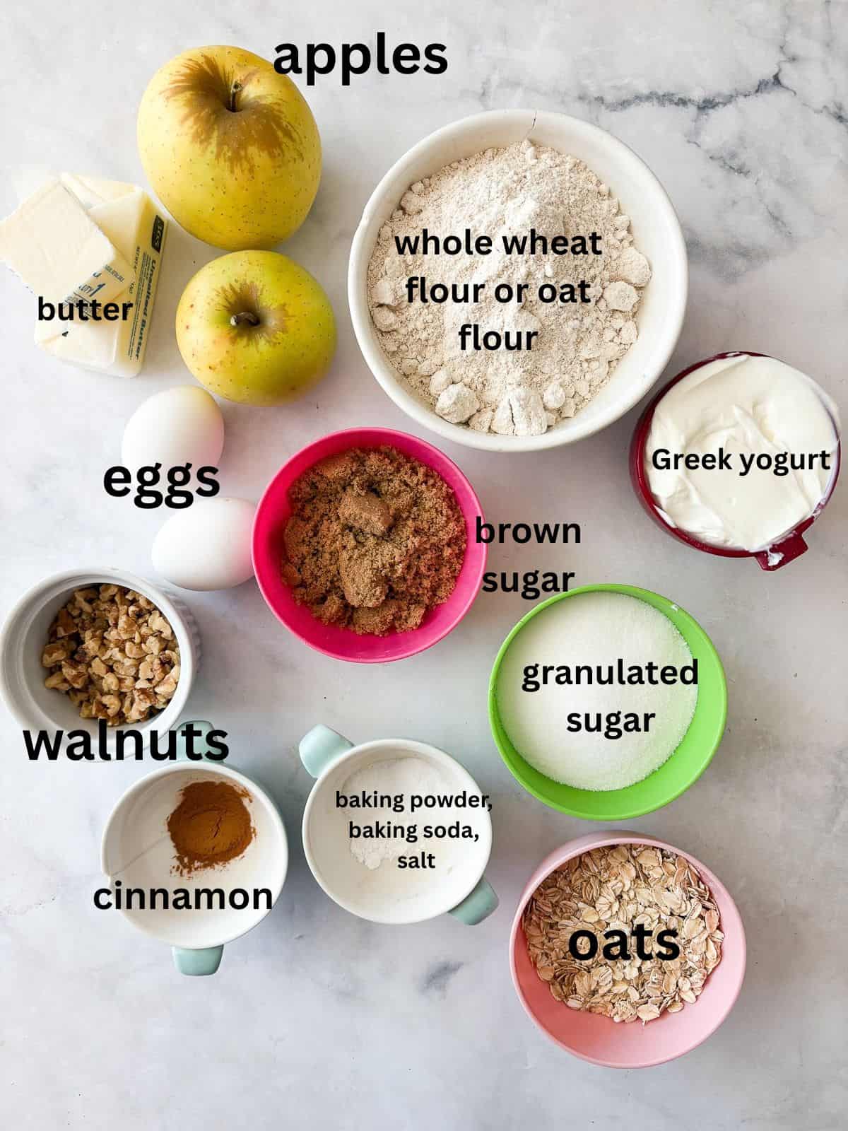 This delicious apple crumb cake is layered with apples, cinnamon, oats, and walnuts. Make it with whole wheat or oat flour for a GF version. Apple crumb cake ingredients are text-labeled.