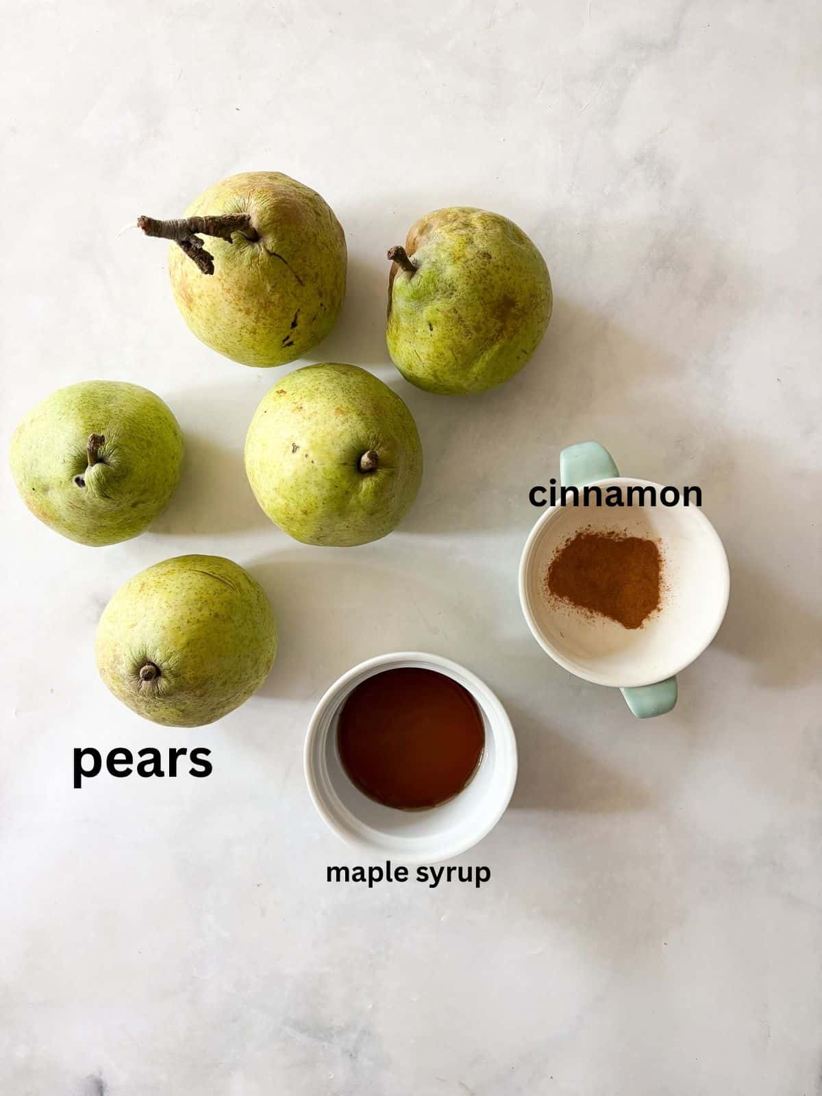 A smooth, sweet pear sauce that's best made with ripe pears! Add cinnamon and maple syrup if you like, or enjoy it plain. Ingredients for pear sauce are text-labeled.
