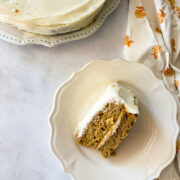 A slice of gluten free pumpkin layer cake on its side on a plate.